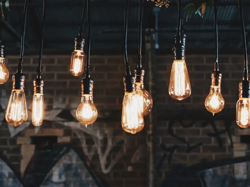 Lightbulbs hanging from the roof in their contacts. Illustrating the customer journey mapping insights thats required.